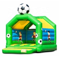 Château gonflable de football de qualité commerciale avec une grande balle sur le dessus pour les jeux d'enfants en plein air
