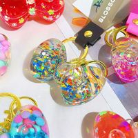 Couple Cadeaux Poupée Sac Clé Pendentif Quicksand Bouteille Porte-clés Liquide Huile Coulant Sable Bulle Perles Arc Liquide Porte-clés