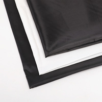 Prix usine Tissu pongé asiatique uni noir 100% polyester 150m 80gsm à armure toile pour doublure
