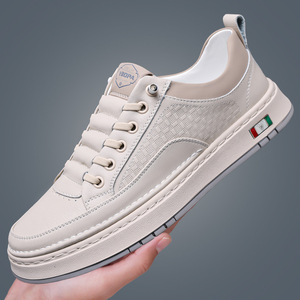 รองเท้าผ้าใบหนังสีขาวลำลองสำหรับผู้ชาย ส้นเตี้ย พื้นยางระบายอากาศ ผลิตที่เวินโจว - Product Image 1