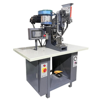 Machine à œillets entièrement automatique