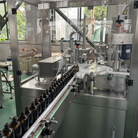 Machine automatique de remplissage et de capsulage de bouteilles d'huiles essentielles avec ligne d'emballage de bocaux de bouteilles rondes