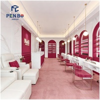 Ensemble de mobilier élégant rose et blanc pour salon de manucure, chaise et table de manucure, design intérieur personnalisé pour studio de manucure et boutique de nail art, fourni directement par l'usine.