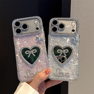 เคสโทรศัพท์มือถือลายเปลือกหอยไล่สีประดับเพชรรูปโบว์น่ารักสำหรับ iPhone 17 16 15 Pro Max  แบบกระจกเงา ลายแมว KT  พร้อมฝาหลังลายการ์ตูนน่ารัก - Product Image 1