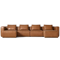 Canapé modulaire en cuir de haute qualité avec assise cascade et coussins rembourrés, idéal pour hôtel et salon