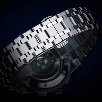Montres mécaniques lumineuses en acier pour hommes, avec calendrier complet et design similaire au Flywheel, fabriquées en usine pour marque privée