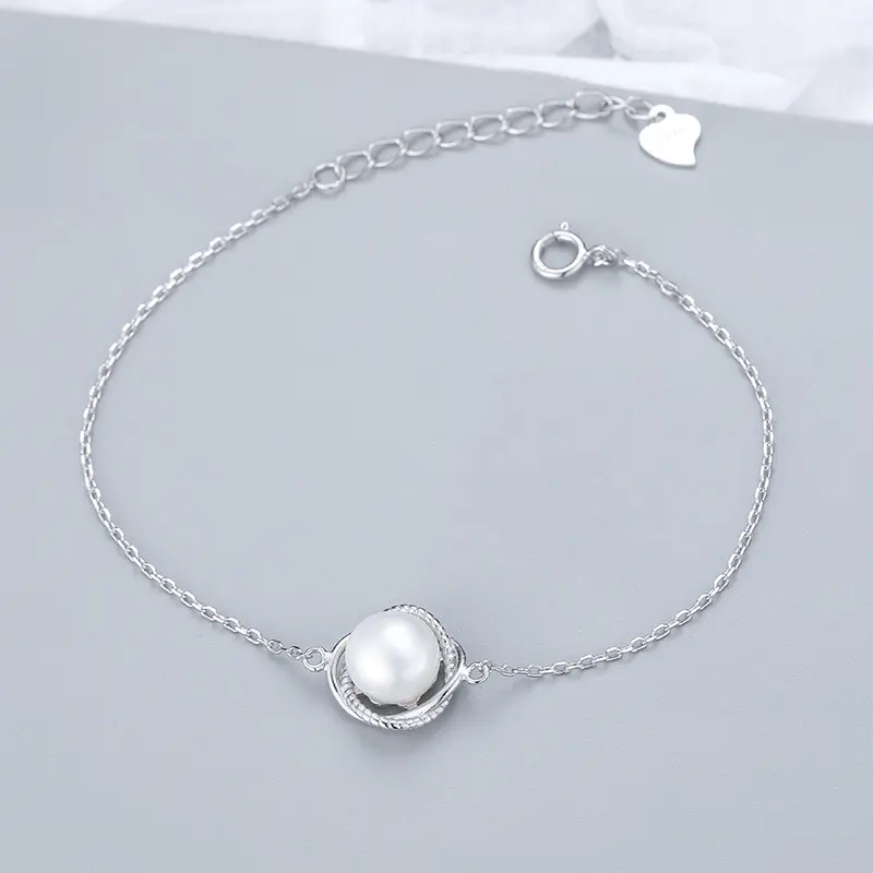925 Silber vergoldet niedlich kultiviert Süßwasser Knopf Tropfen Perle vierblättriges Klee Blume Zirkon Charme-Armband für Damen