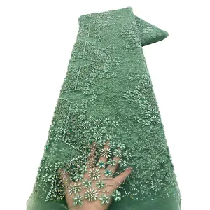 Nio. AI ricami di lusso con perline di paillettes tessuto da sposa verde chiaro con paillettes in pizzo da sposa e perle tessuto di pizzo