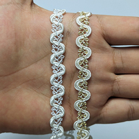 Ruban tressé Clarin 10 mm en polyester/nylon écologique pour vestes féminines, idéal pour les poignets, les patte de boutonnage et les ourlets.