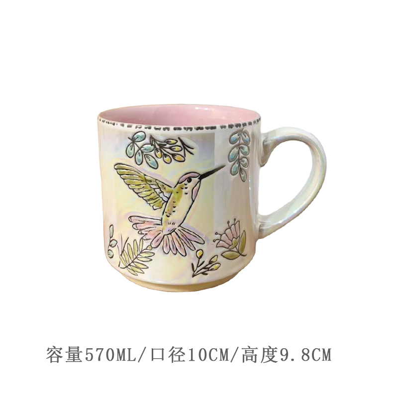 Taza con diseño de pájaro y perla rosa champán.
