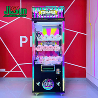 Machine de jeu à griffes en métal noir et plastique avec matériel stable pour parcs d'attractions, distributeur automatique à monnayeur