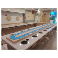 Système de convoyeur à sushis en acier inoxydable pour restaurant avec table rotative, vitesse réglable et conception durable