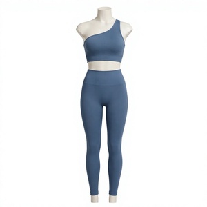 Conjunto de yoga de dos piezas para mujer: sujetador deportivo asimétrico de un solo hombro transpirable de elastano/nailon y leggings de cintura alta acanalados de color liso. - Product Image 1