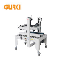 GURKI Scelleuse automatique électrique de fond de carton la plus vendue pour l'emballage de boissons, produits chimiques et rubans en papier – Excellent service