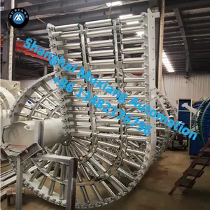 Shanghai Muxiang Vertical Lifting Spiral Conveyors Gravity Roller Conveyor/apollo Conveyor Elevator Transfer System Sure