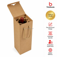 Caja de regalo profesional personalizada para una sola botella de vino, de cartón kraft, con asa de cuerda trenzada, tapa abatible y cierre interior tipo tuck flap.