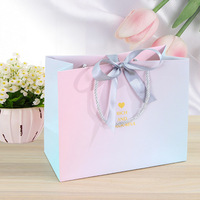 Sac cadeau haut de gamme de style européen et chinois avec dégradé rose, en matériau cartonné blanc, pour mariage et emballage de souvenirs