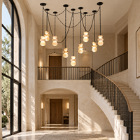 Lustre en acier noir personnalisé avec chaîne, lampe suspendue pour plafond haut, hôtel, villa, multi-lumières