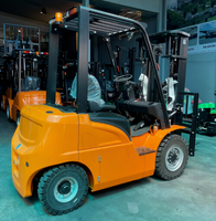 Chariot élévateur à moteur thermique de 1,5 tonne avec fourches rotatives pour la manutention de matériaux sur les chantiers de construction et les exploitations agricoles - Vente en gros usine
