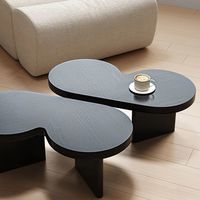 Mesa de Centro Moderna Minimalista de Madera Negra con Forma Irregular y Diseño de Mariposa para Sala de Estar