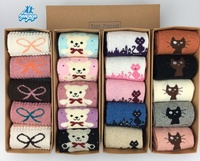Chaussettes de Noël chaudes pour femmes, en polaire douce, avec semelles antidérapantes, idéales pour les fêtes, en lot cadeau