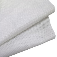 Bon matériau de tissu humide Spunlace tissu non tissé 10 Viscose 90 Polyester Spunlace rouleau de tissu non tissé