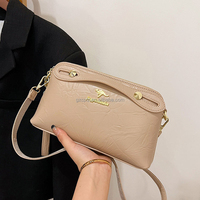 Sac à bandoulière en cuir PU pour femme, vente en gros d'usine, sac bandoulière luxueux couleur bonbon, sac professionnel pour femme