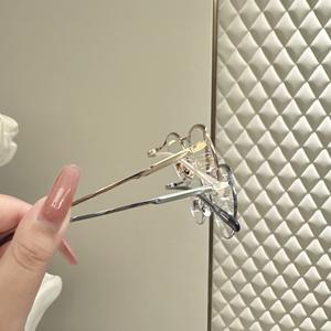 Montures de lunettes rétro ovales en métal, largeur moyenne, verres en résine, unisexe, Danyang 6330 - Product Image 1