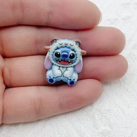 Dibujos animados azul brillante Alien Fangtooth Diy accesorios de resina caja de teléfono basura encantos cadena colgante decoraciones suministros