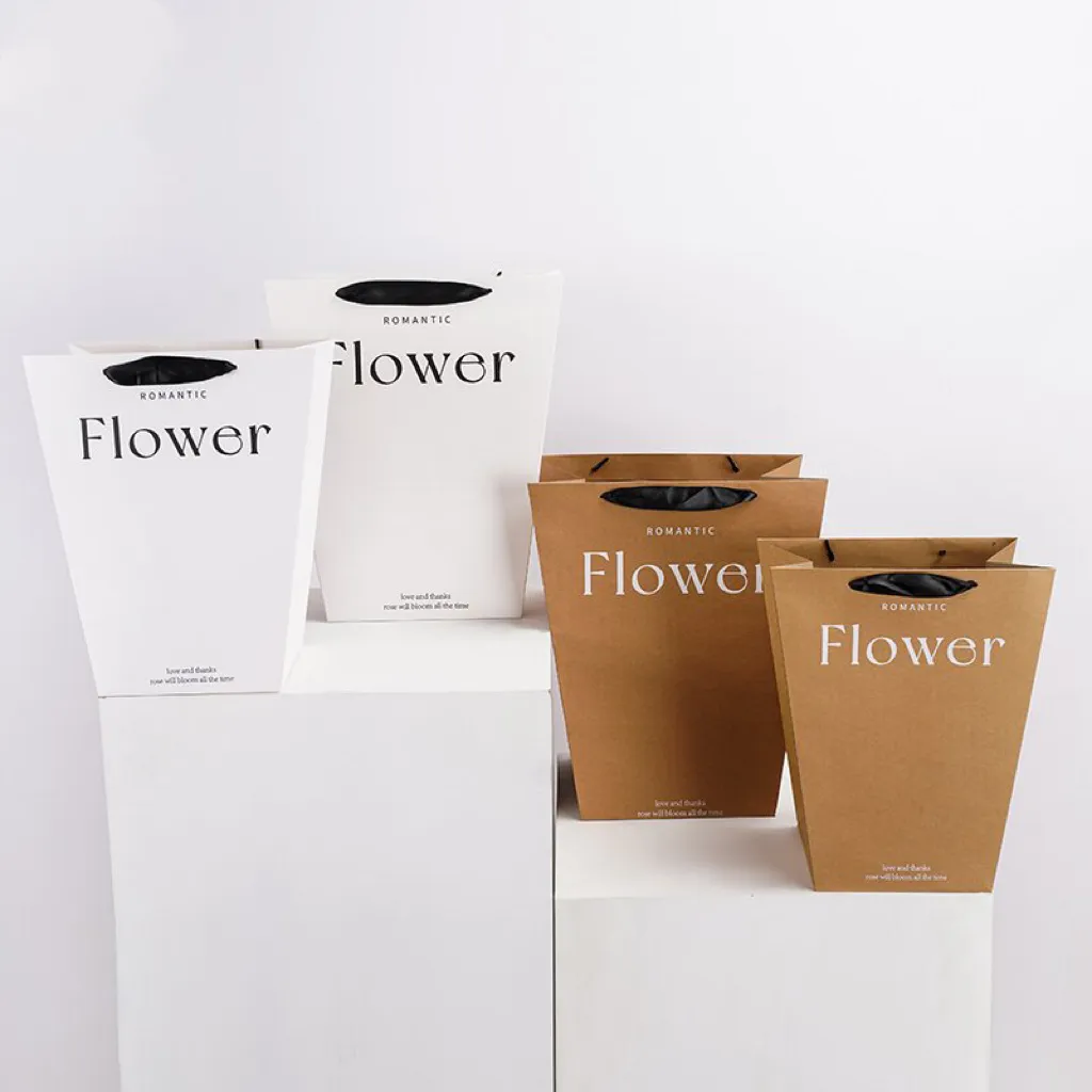 Venta al por mayor de fábrica, bolsa de papel Kraft, regalo de flores para el Día de San Valentín, caja de flores, embalaje con asa de cinta