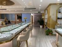 Vitrine d'exposition de montres et bijoux LED de luxe moderne, en acier inoxydable durable, MDF, verre, avec cadre en métal doré YIZHAN YZ-01, pour usage en centre commercial