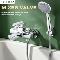 Système de douche mural chromé poli avec mitigeur monocommande, cartouche céramique, jet pluie et douchette à massage doux