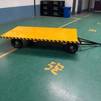 Chariot à plateforme robuste industriel en acier jaune à 4 roues, capacité 2 tonnes, pour entrepôt, usine et logistique