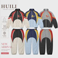 Ensemble pantalon large et coupe-vent à séchage rapide pour homme, collection automne 2026 Huili, color block personnalisé, fournisseur ODM OEM
