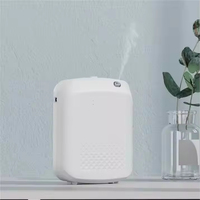 Diffuseur d'huiles essentielles de luxe en gros, nouveau design, diffuseur électrique mural, parfum d'oud, sans eau, petit diffuseur de table, pour la maison
