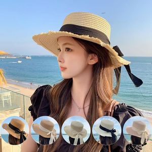 Xi Boyu Sombrero de paja deshilachado de copa plana con lazo y ala ancha, sombrero de protección solar para playa de verano para mujer, color sólido - Product Image 1