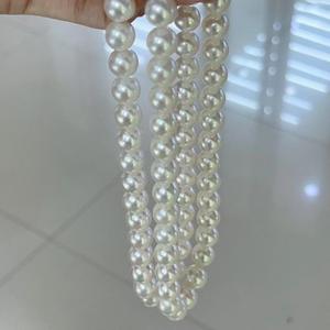 สร้อยคอมุกน้ำจืดทรงกลมสีขาวธรรมชาติ ขนาด 10-12 มม. คุณภาพสูง ดีไซน์หรูหรา แสงเงางาม พร้อมตำหนิเพียงเล็กน้อย บรรจุในกล่องของขวัญ - Product Image 3