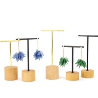 Présentoir à bijoux en bois massif noir et laiton, avec supports en métal doré en forme de T pour boucles d'oreilles