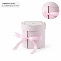 Boîte cadeau cylindrique rose clair avec couvercle séparé et détail ruban pour accessoires de beauté et bijoux, vente au détail et en gros