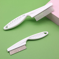 Peigne anti-puces à dents en acier inoxydable pour chien et chat Peigne de beauté Peigne pour animaux de compagnie Peigne de poils à dents fines