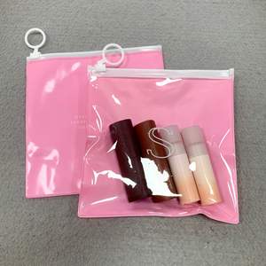 Bolsa Cuadrada Transparente de PVC Rosa Suave Personalizada para Empaque de Lápiz Labial y Bálsamo Labial con Cierre de Tirador Blanco OEM - Product Image 2