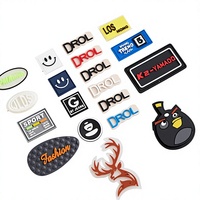 Étiquettes en caoutchouc souple PVC 3D personnalisées de qualité supérieure avec finition plastique pour presse à chaud ou à coudre sur les sacs à bagages, les chapeaux et les vêtements