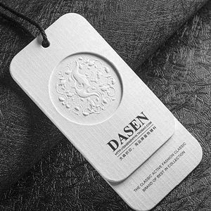 Embossed <b>Paper</b> Clothing Hang Tag Custom Brand Swing Tag for Fashion Garment Accessories - Product Image 1