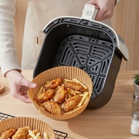 Papiers de cuisson en parchemin marron anti-graisse personnalisés OEM de qualité alimentaire pour paniers et plateaux de friteuse à air