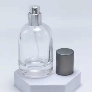 Customized <b>Glass</b> Bottle Cylindrical 50ml 100ml Perfume Bottle with Sprayer Silver Cap for Personal Care <b>Glass</b> <b>Container</b> - Product Image 4