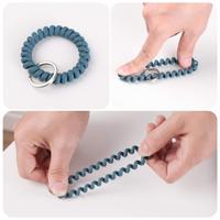 Porte-clés spirale flexible en plastique, bracelet extensible, porte-clés élastique enroulé pour cadeau promotionnel