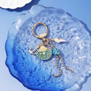 Oferta de Verano: Encantadores y Divertidos Adornos con Forma de Concha Marina, Decoración con Patrón Azul Océano, Dijes para Bolsos con Pedrería, Perlas y Detalles Dorados - Product Image 4