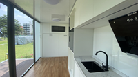 Maison préfabriquée modulaire solaire traditionnelle insonorisée de 11800 mm à deux étages, prête à l'emploi, type « Apple Cabin », pour chambre d'amis dans le jardin