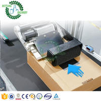 Étiqueteuse auto-adhésive à surface plane de boîte de carton de livre de bouteille chimique de bureau avec imprimante de code de date