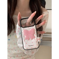 Coque de téléphone tendance en cuir texturé rose avec nœud, compatible iPhone 17 Pro Max, iPhone 16 et iPhone 15
